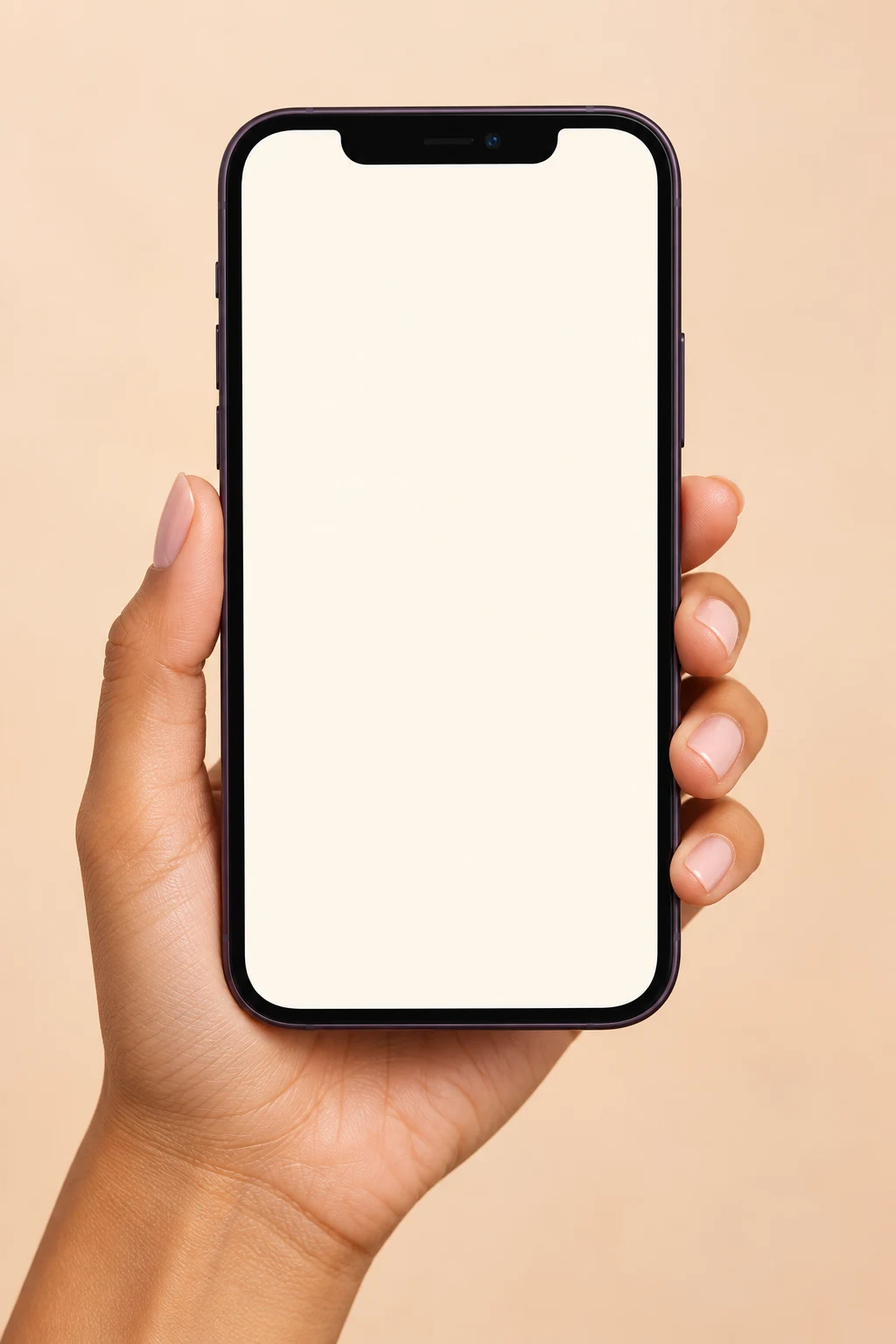 A hand holding a smartphone showing a conversation with the ATTA coach